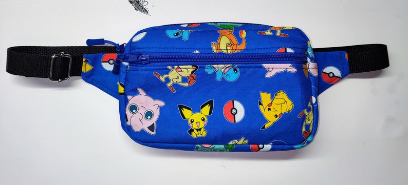 Blue Pokémon and Poké Ball print fanny pack