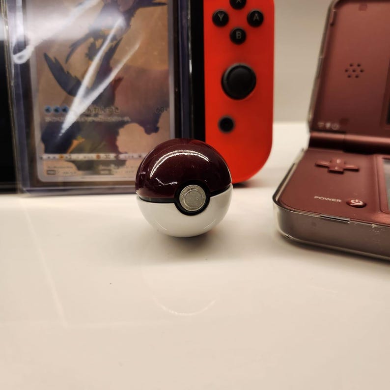 Realistic mini Pokéball replica product view 2