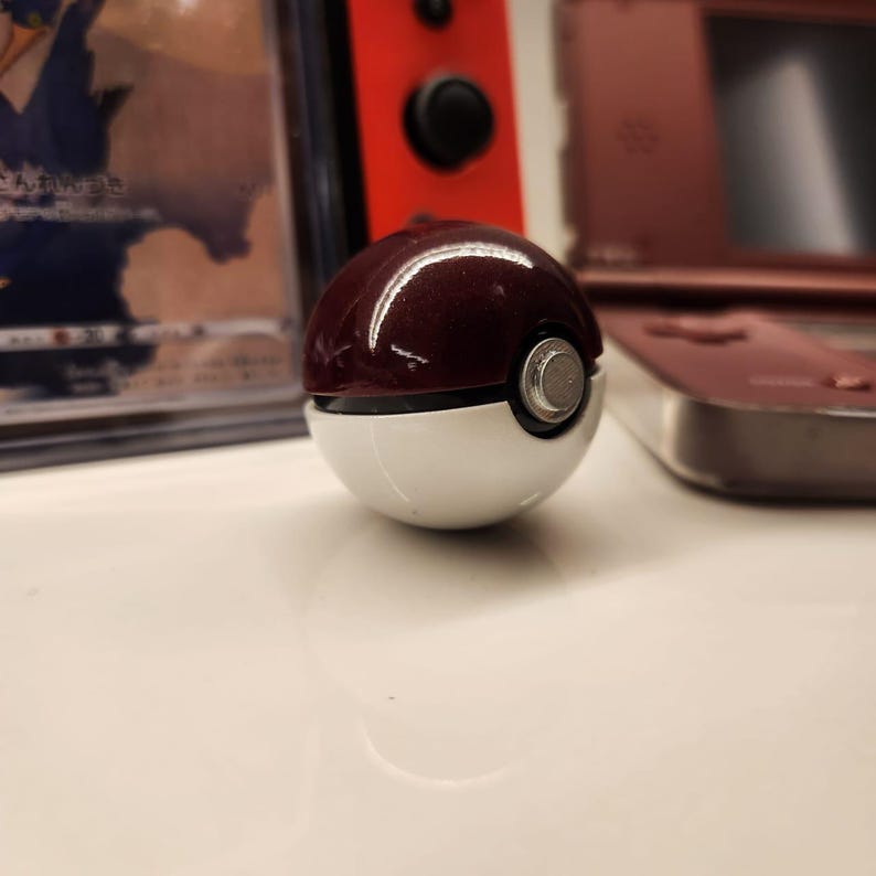 Realistic mini Pokéball replica product view 3