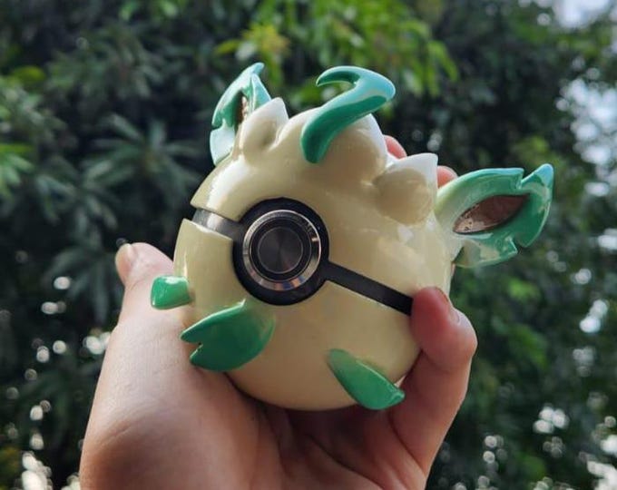 Leafeon-themed realistic Pokéball replica with LED lighting