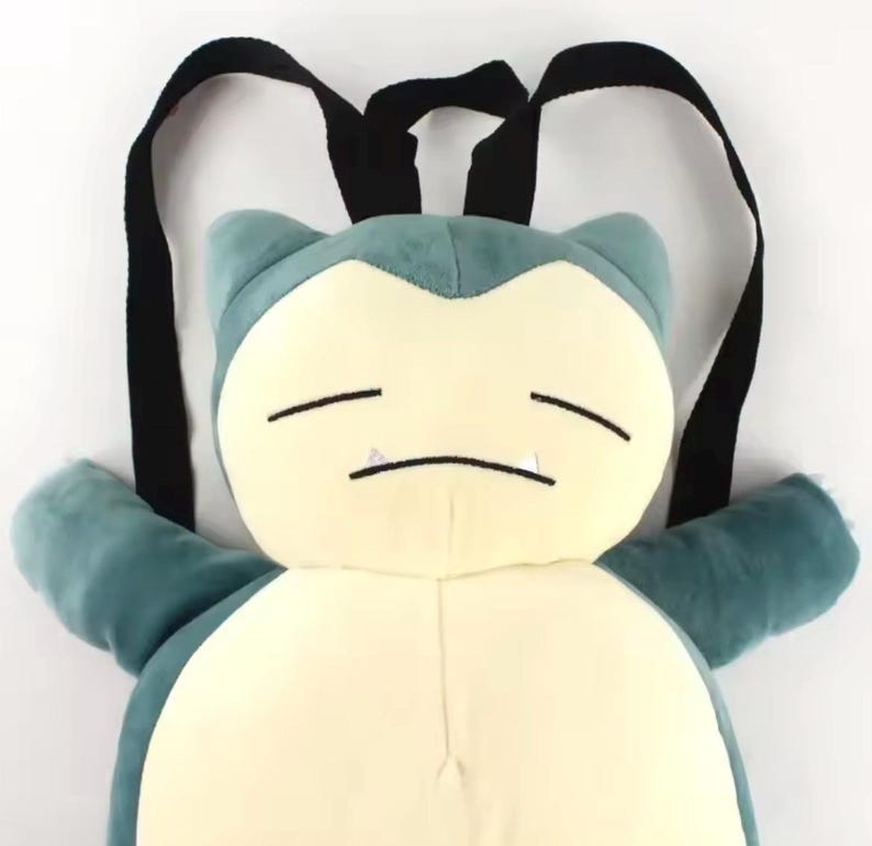 Soft Snorlax plush character backpack with adjustable black straps