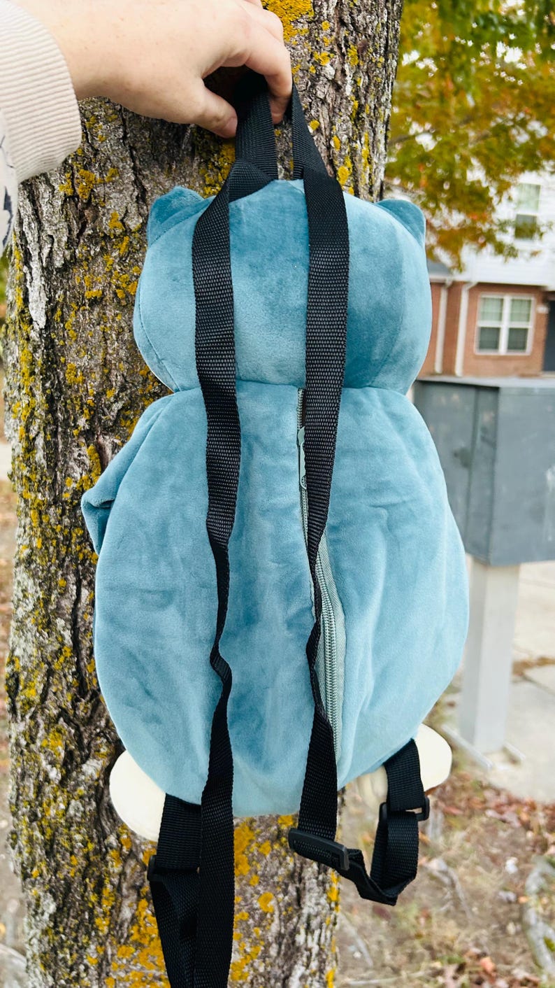 Snorlax plush backpack rear view with adjustable straps
