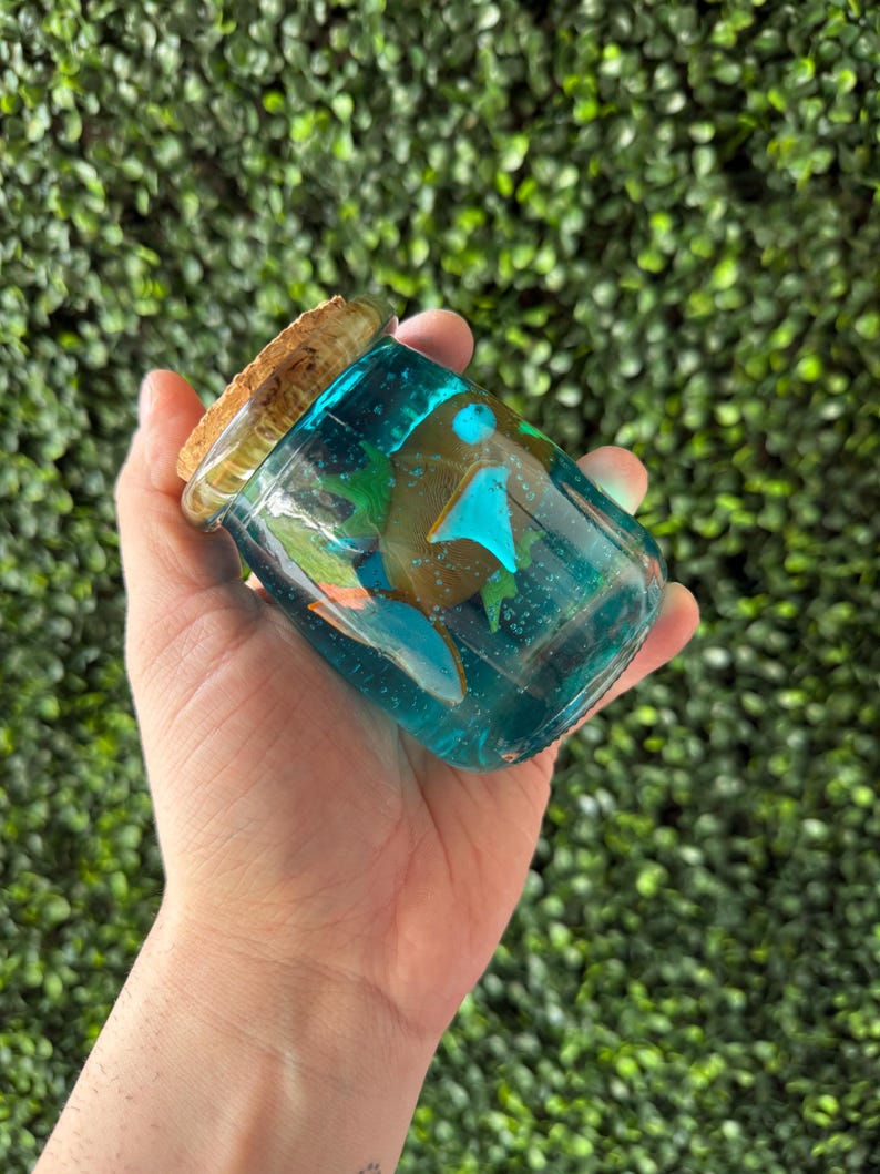 Magikarp fish in a glass bottle product view 2