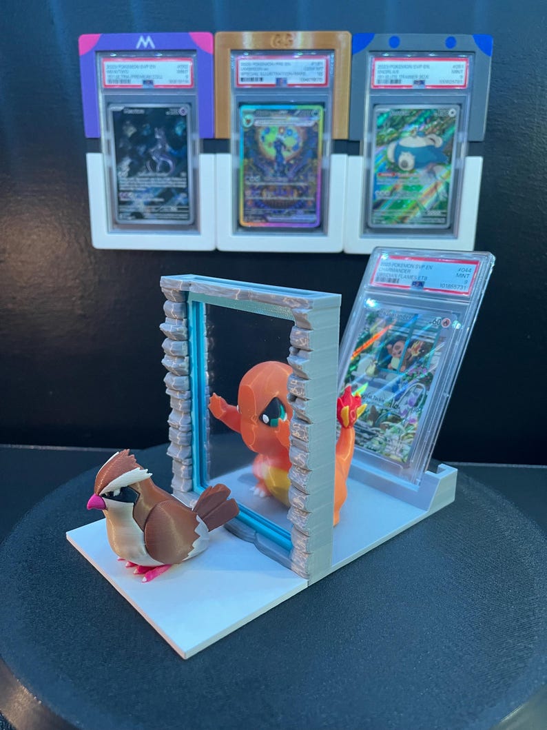 Charmander and Pidgey graded-card window display product view 6